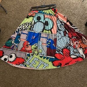 Pleated long comic skirt. S/M